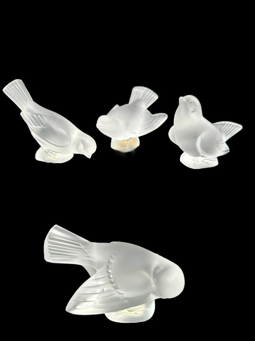 4pc Set of Lalique France Frosted Crystal Birds: 4 Piece set of Lalique France frosted crystal sparrow birds. Engraved on bottom. Excellent condition. Measure 2.5" x 4" x 3.5".