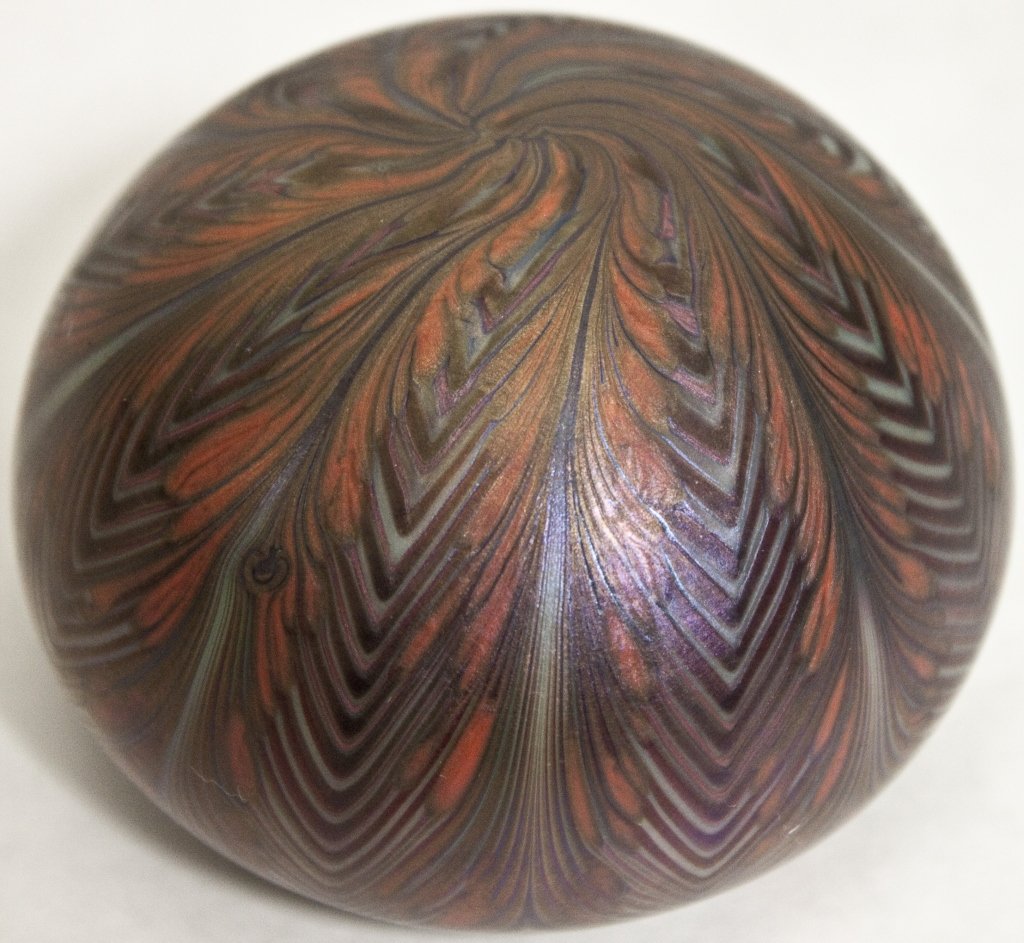 Orient And Flume Irredescent Glass Paperweight: Orient And Flume iredescent glass paperweight. Signed and numbered "123 D 73". Measurements: 3.25"d x 2" h Period: Mid Century / Modern Artist: Orient and Flume