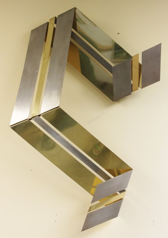 C. Jere Geometric Brass & Chrome Wall Sculpture: Curtis Jere brass and chrome geometric wall sculpture. Signed, "Jere '84". Measurements: 26" x 8" x 36" Period: Modern Artist: Curtis Jere