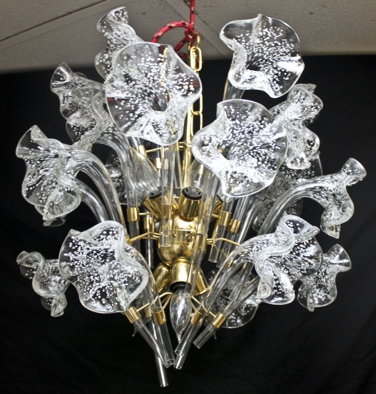 Murano Glass Lily Form Chandelier: Murano Glass "lily" form chandelier. Brass frame and fixtures with (24) white-flecked crystal lilies: 1 tier of (6), 1 tier of (12), and another tier of (6). Measurements: 24"d x 24"h Period: Mid Cent