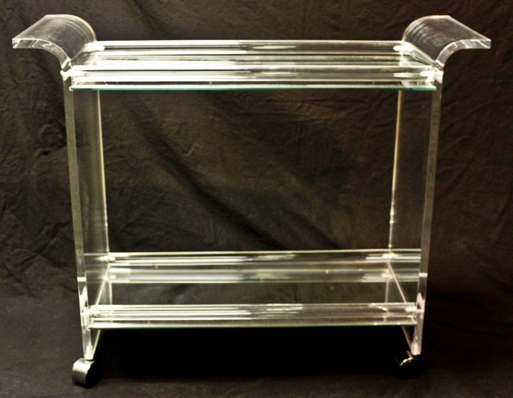 Mirrored Lucite Tea Cart / Server: Contoured Lucite tea cart / server with mirrored shelf and top. Measurements: 38.75" x 14" x 31.75" Period: Mid Century / Modern