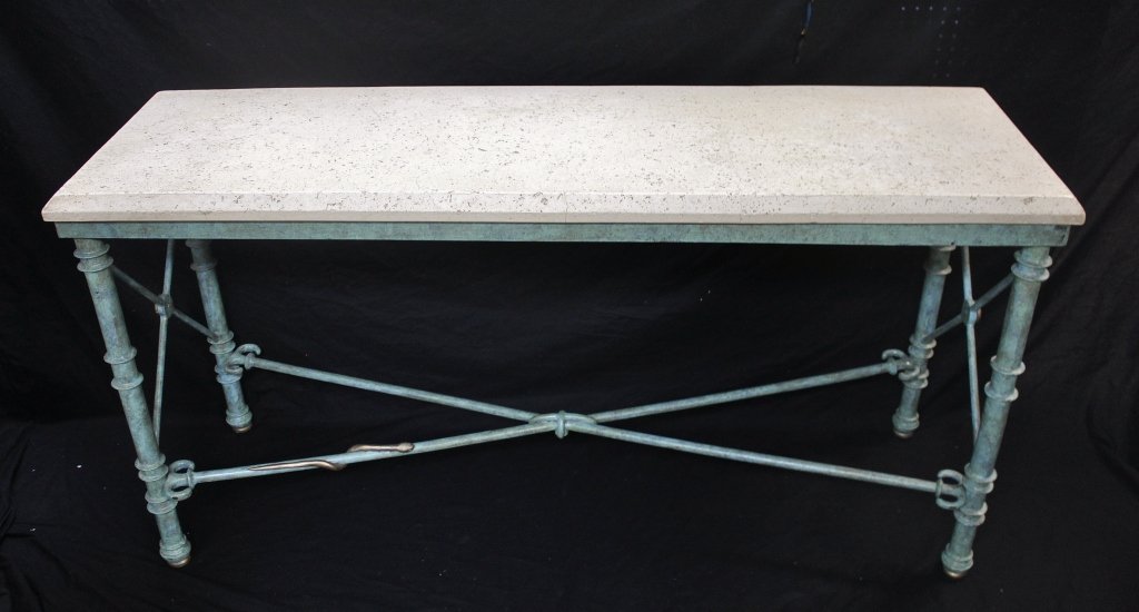 Wrought Iron and Coquina Stone Console Table: Wrought Iron console table with Coquina stone top. Iron decorated with a verdegres finish and accented with an intertwining dore finish serpent / snake on lower stretcher. Measurements: 59" x 18" 30.5