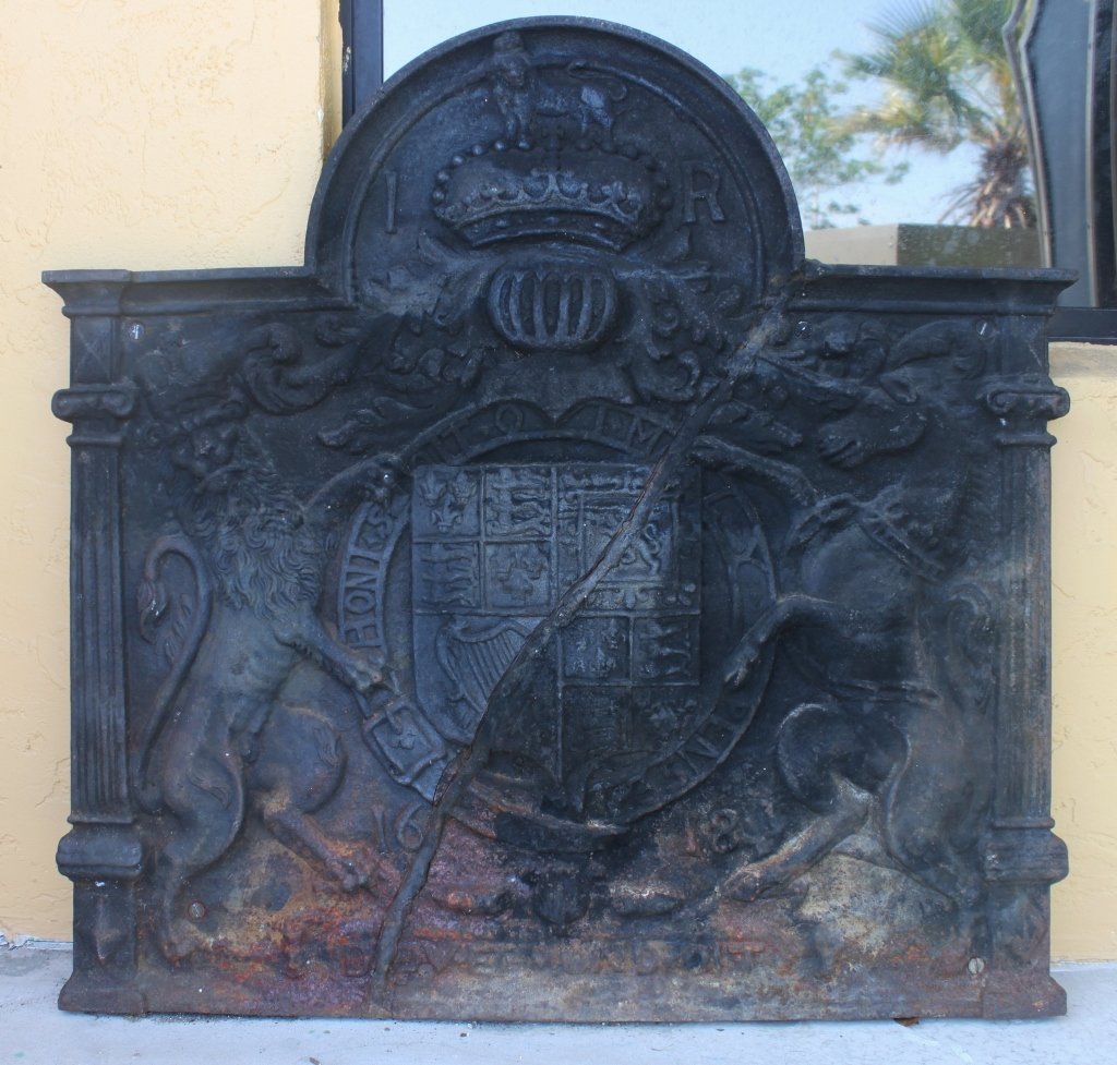 Jane Austen's Jacobean Cast Iron Fireplace Back.: 15th century Jacobean cast iron fireplace back displaying the English Coat of Arms and dated 1618. Had been cracked in half and restored. Re-welded and mounted on a 1/4" steel plate. From the childhoo