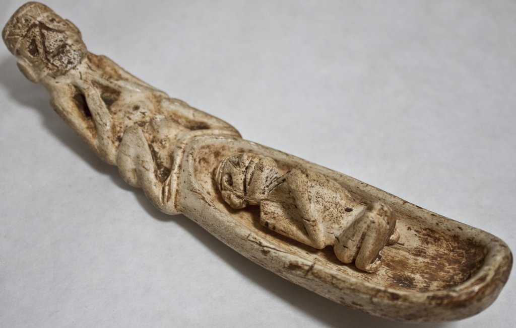 (2) Piece Pre-Colombian Bone Fertility Carving: (2) piece Pre-Colombian bone fertility carving depicting mother with child. Dominican Thaino. Measurements: 7.5" x 2" x 1.5" Period: Pre-Colombian