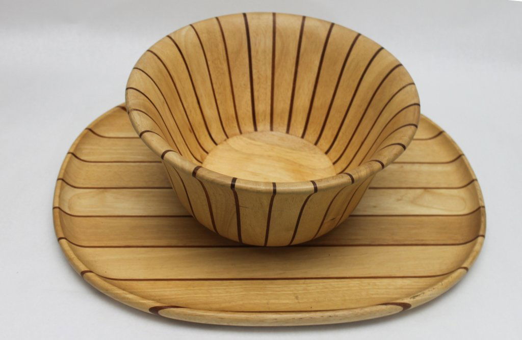 Jens Quistgaard Teak Bowl & Platter for Dansk: Teak bowl and platter designed by Jens Quistgaard for the Northwoods Collection by Dansk. Bowl measures 13.75d x 7". platter measures 18" x 10.5" x .75"." Measurements: See Description Artist: Jens Qu