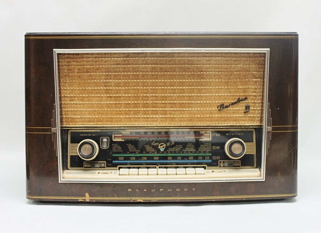 Blaupunkt Barcelona Super Hi-Fi Radio: Blaupunkt Super Hi-FI radio, circa 1950. Barcelona model. Mahogany case with three bands, (2) dials, and (8) buttons. Measurements: 25" x 10" x 15.5" Artist: Blaupunkt