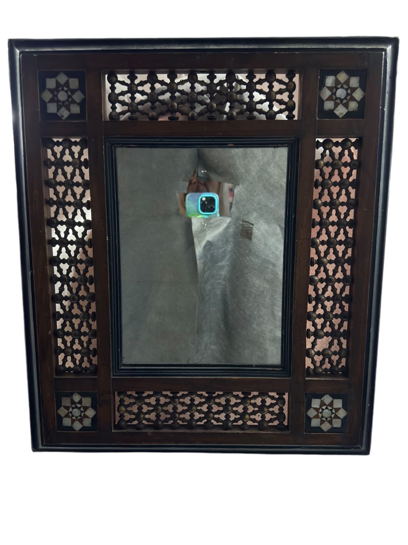 Moroccan mirror with ball and stick fret work and inlaid mother of pearl decoration at the corners. (1 of 10)
