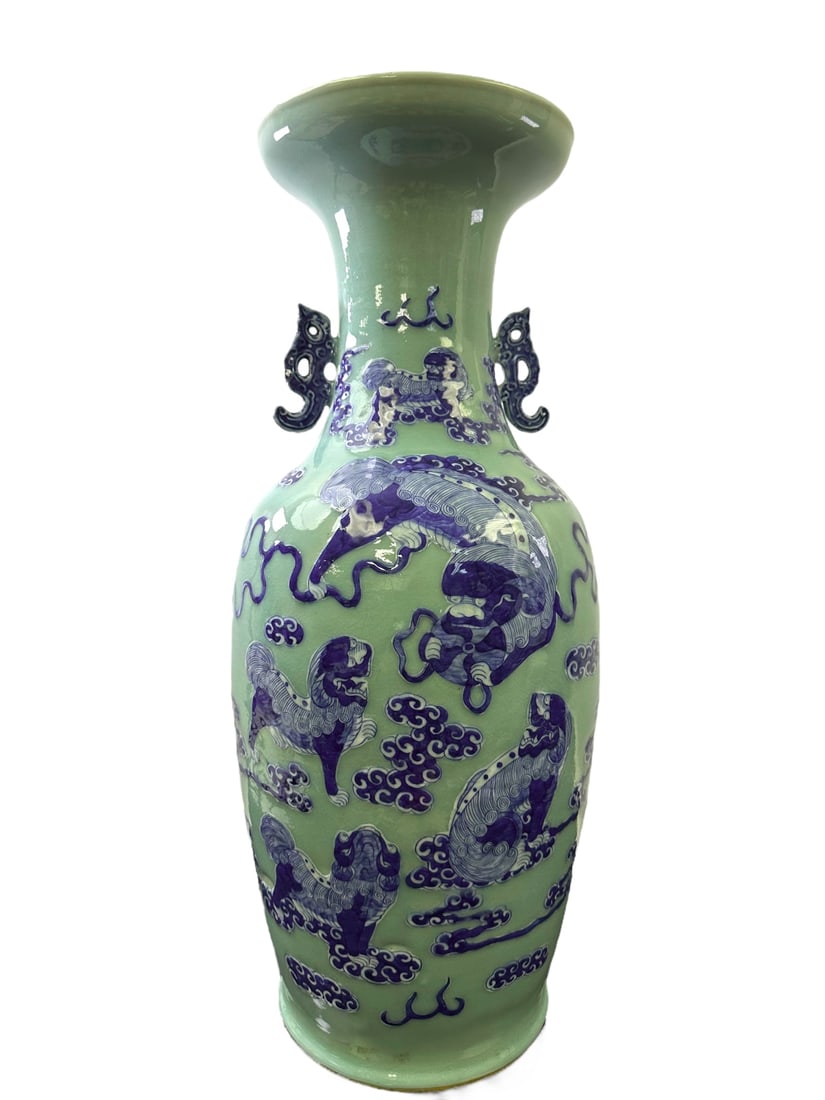 Large antique celadon vase with foo dogs and shishi lions in the clouds, porcelain with blue green: Large antique celadon vase with foo dogs and shishi lions in the clouds, porcelain with blue green monochrome glaze and cobalt blue underglaze, 2 dragon handles. Excellent condition. Measures 10" dia.
