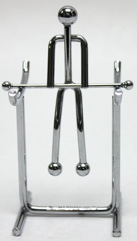 Modern Otagiri Perpetual Motion Swinging Figure: Modern Otagiri kinetic art perpetual motion swinging figure. Measurements: 2.5 x 2.5" x 4"" Artist: Otagiri Style: Modern