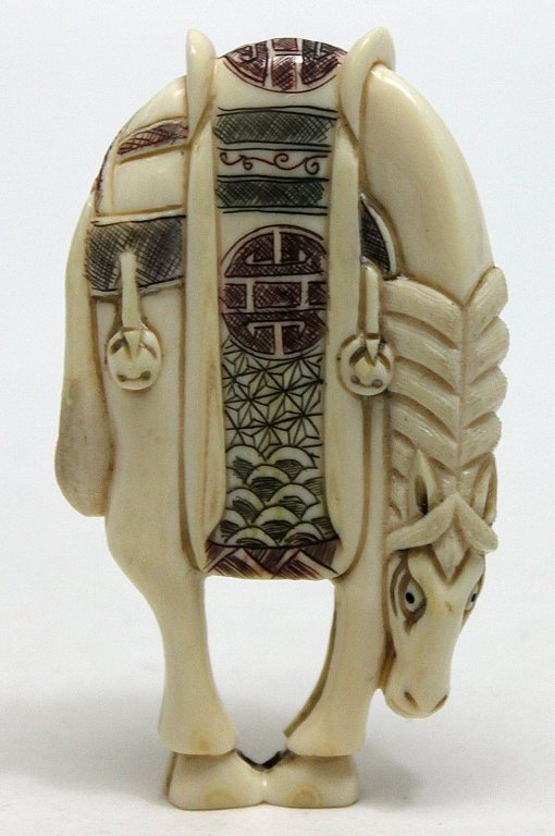 Hand Carved Ivory Netsuke Horse: Hand carved ivory Netsuke horse with polychrome detail. Piece is in excellent condition with absolutely no loss and is marked on the bottom. Measurements: 1.75 x .5" x 3"" Style: 19thC