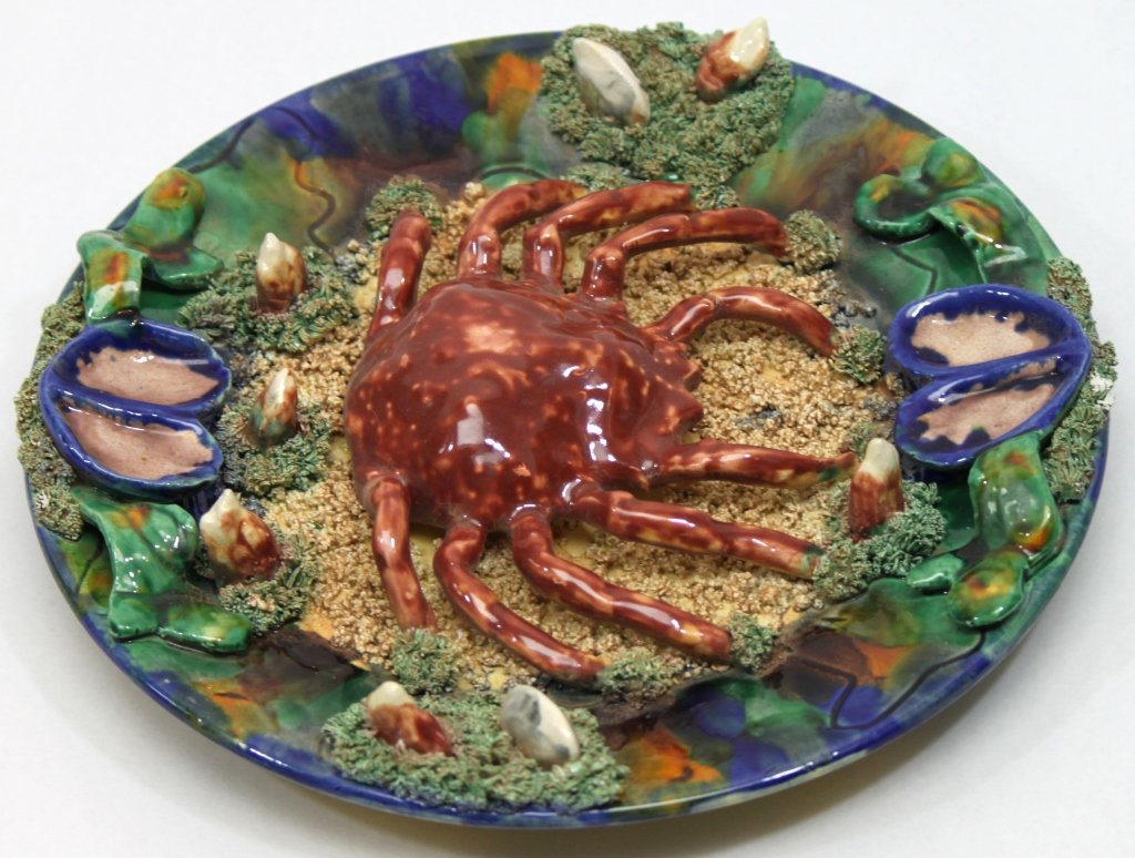 Minton Palissy English Majolica Plate w/ Crab: Minton Palissy English majolica plate encrusted with sea life and a full-figure crab. Base impressed Minton" and wavy-line mark" Measurements: 11.5dia" Artist: Minton Style: Late 19thC