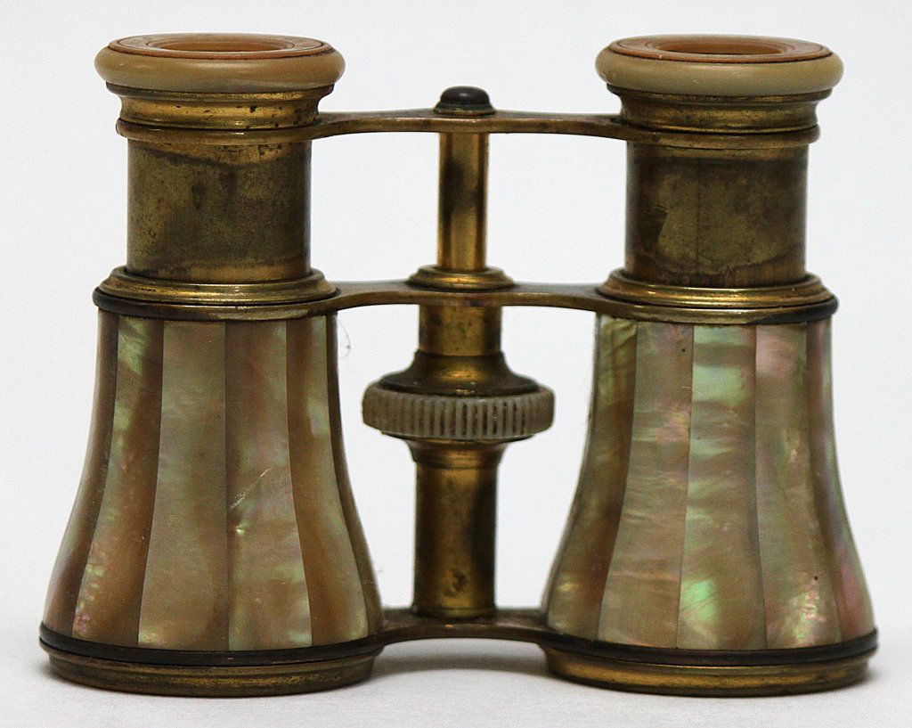 LeMarie Mother of Pearl Opera Glasses: LeMarie mother of pearl opera glasses. Some loss of gold leaf around lenses and scratches on lenses themselves other than that excellent condition. Inscribed Le Marie FI Paris"." Measurements: 4 x 3.2