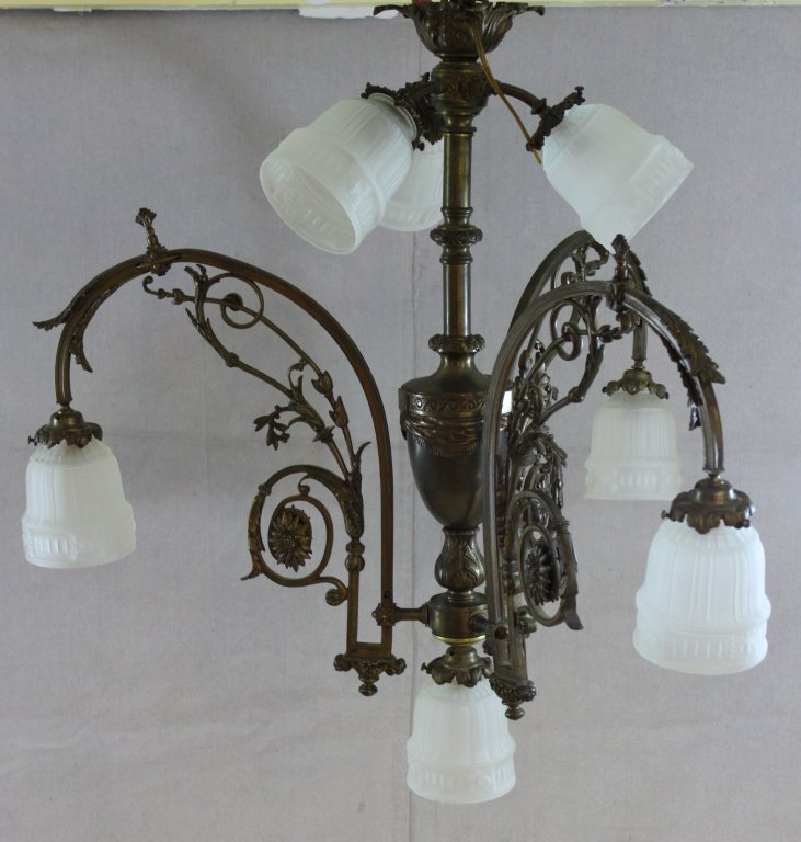 French Art Nouveau Gasolier Dining Room Fixture: Brass seven light French art nouveau gasolier hanging dining room fixture converted to electricity with opaque glass shades. Measurements: 29dia x 27.5"" Style: Late 19thC