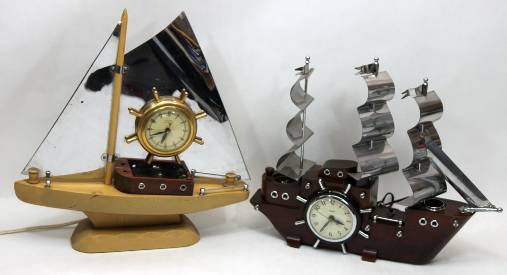 (2) Sailboat Shaped TV Lamps w/ Clocks: Two sailboat shaped TV lamps with clocks. The clock faces say United". Darker colored boat measures 18" x 5" x 16", lighter colored boat measures 18" x 5" x 18.75"" Measurements: See Description Style