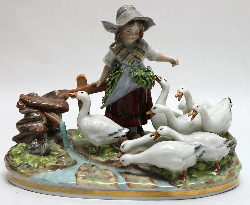 Royal Capodimonte Porcelain Young Girl With Geese: Royal Capodimonte porcelain young girl with a gaggle of geese. Measurements: 10.5 x 5.5" x 7"" Artist: Capodimonte Style: MidC Modern