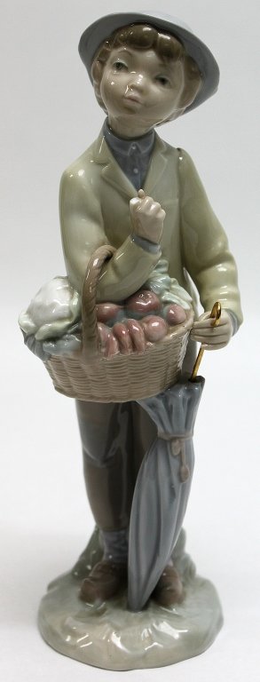 Lladro Porcelain Figurine Little Gardener"": Lladro retired porcelain figurine Little Gardener", sculpted by Julio Fernández and produce from 1970 to 1981" Measurements: 4 x 4" x 10.25"" Artist: Lladro, Julio Fernández Style: MidC Modern