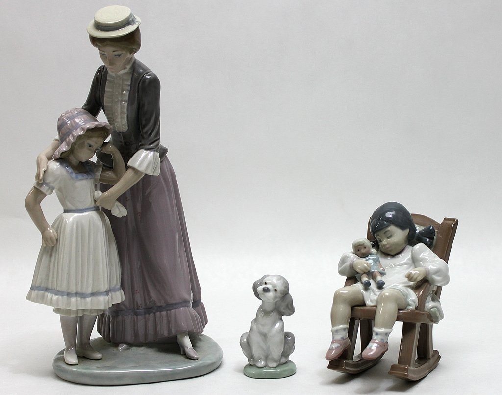 (3) Lladro Figurines of Woman, Children, and Dog: Two retired Llardo figurines. Naptime" sculpted by José Puche and released from 1987 to 2004, "Comforting her Daughter" sculpted by Vicente Martínez and produced from 1982 to 1991. Also included is 