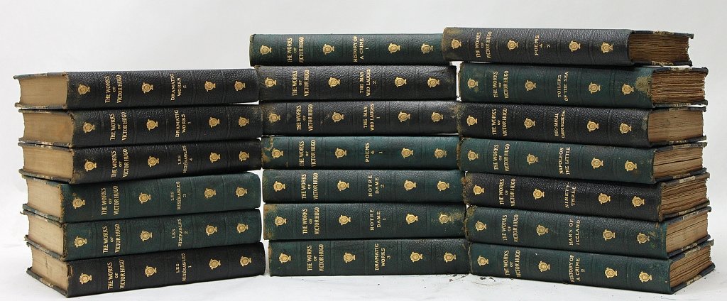 (20) Victor Hugo Books: Lot of 20 Victor Hugo books including Les Miserables", "Notre Dame", "A Man Who Laughs", and "History of a Crime"." Measurements: 6 x 8.5" x 1.5"" Artist: Victor Hugo Style: 20thC