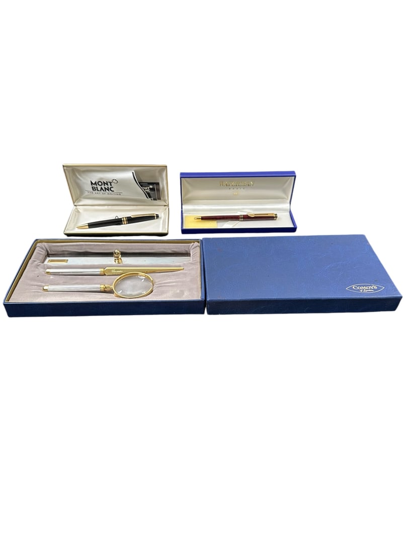 3pc Pen & Desk Set Mont Blanc, Waterman & Comoys: 3 Piece pens and desk sets (1) Mont Blanc, The art of writing, black and gold twist ink pen, medium point, paperwork included, writes, in original box, measures 5.5", (1) Waterman Paris ink pen, does 