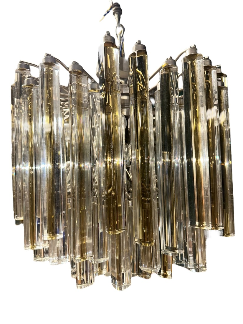 Camer Murano Italian Glass Chandelier: Camer Murano Italian glass chandelier with prisms and nickel frame, outer prisms are two tone with amber color. Well over 100 prisms. Measures 20" dia. x 16". Can you say stunning? WOW!
