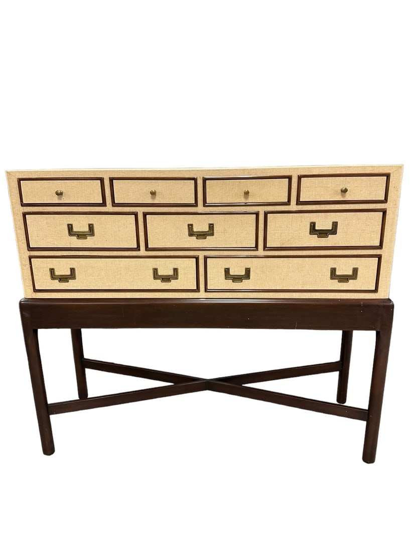 Karl Springer Style Grasscloth & Wood Console Tbl: Karl Springer style grass cloth finish with wooden X base console table, bronze hardware on 9 drawers. Excellent condition. Measures 48" x 16" x 40".