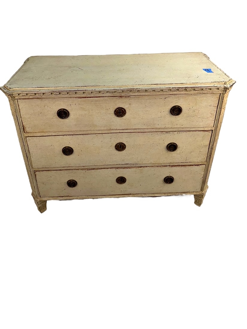 Swedish 1820s Gustavian Style White Painted Chest: Swedish 1820s Gustavian style white painted chest, 3 dove tail drawer, locking, circular brass pulls, tapered legs. Excellent condition. Measures 39" x 17" x 31". #4 Piece sitting on dolly if you see 