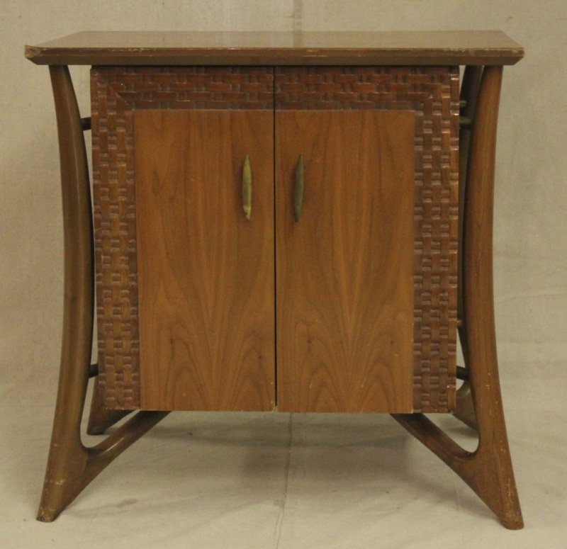 Mid Century Modern Nightstand: Mid-Century modern nightstand with a carved basket weave detail on front. Measurements: 28" x 18" x 28" Style: mid Century Modern