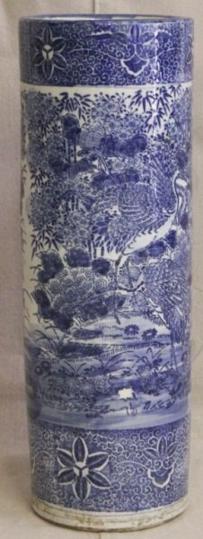 Qing Dynasty Blue and White Umbrella Stand: Qing Dynasty blue and white under glazed umbrella stand. Depicting birds and pond scene. Measurements: 8.5"d x 24.5" Style: Qing Dynasty