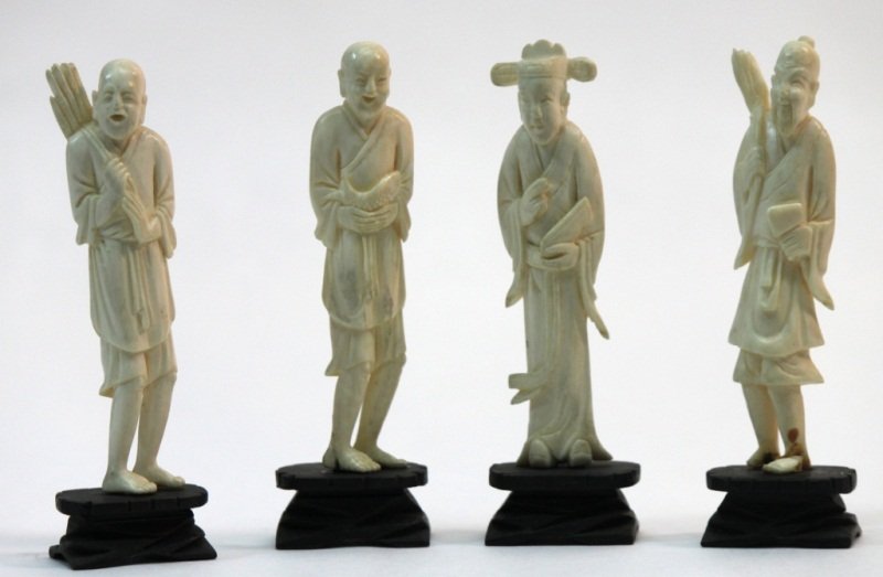 (4) Carved Ivory Male Figures: Lot of (4) small ivory carvings of men with different careers on ebonized wood bases. All are approximately 4in tall. One's feet are broken at the base. Measurements: 4" Style: 20th Century