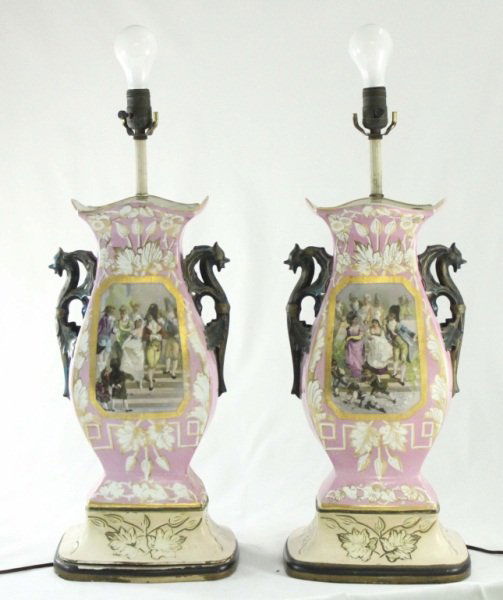 (2) Old Paris Vases Mounted as Lamps: Lot of (2) Old Paris transfer ware vases with hand painted scenes. Detailed dragon handles on both sides now mounted as lamps. Height measures to top of bulb. Measurements: 10" x 9" x 30" Style: Late