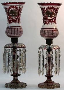 (2)19th Century Persian Glass and Crystal Lusters: Lot of (2) mid 19th century Persian glass and crystal candle luster's. Ruby flashed and enameled with the Persian/Iranian Lion and Sun emblem. Each luster has a slightly different variation of the emb