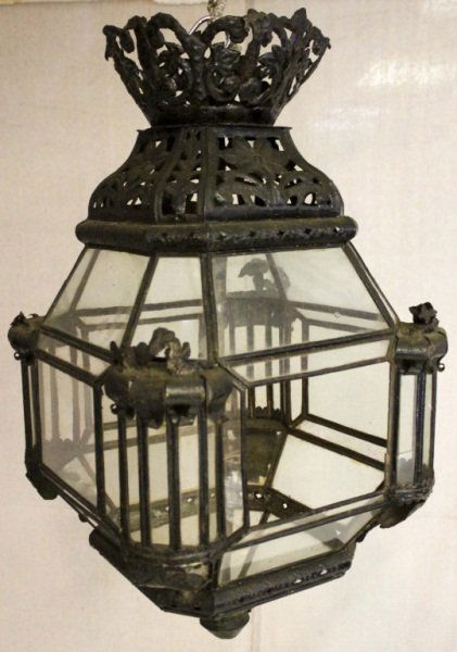 Old Florida Misner Iron Hanging Light: Misner hanging lamp with detailed metal work. Natural patina with natural wear. Same Lamps are hanging on Worth Ave in Palm Beach Florida.