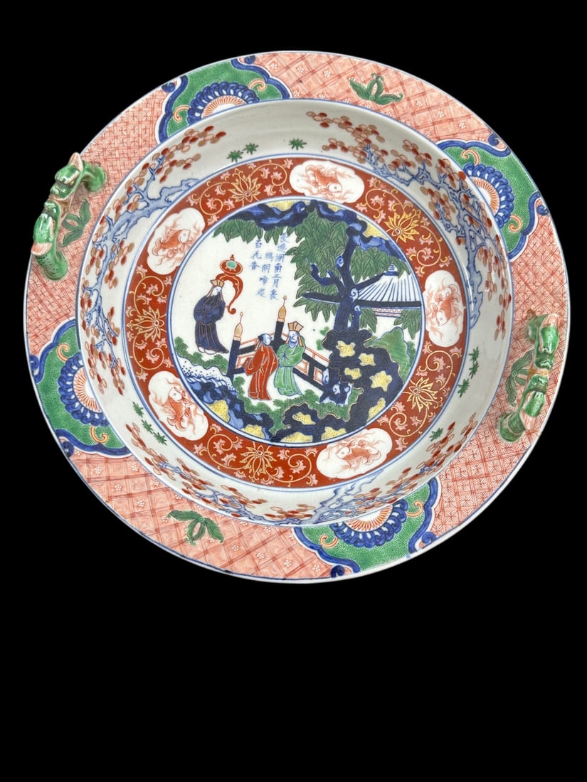19C Meiji Era Japanese Imari Porcelain Plate: 19th Century Meiji Era Japanese Imari porcelain plate with calligraphy and dragon handles (one shows repair), hand painted. Excellent condition, except for dragon handle repair. Measures 12.5" dia. x