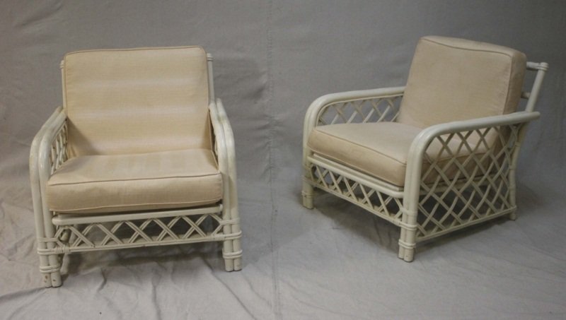 (2) Vintage Rattan Patio Chairs: Pair of vintage rattan patio chairs. Dimensions: 27" x 31" x 28" Period: Mid Century