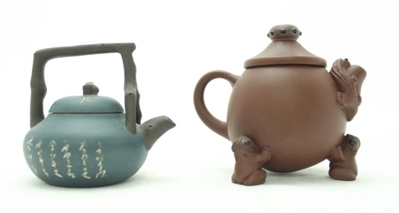 (2) Yixing Clay Teapots: Lot of (2) Yixing clay teapots (Blue) 4 x 3 in (Brown) 5 x 3.5 Period: 19th Century