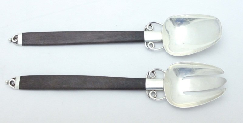 William Sprattling Sterling Silver & Rosewood Salad Ser: William Spratling, Taxco, Circa 1967 Salad Serving Set Condition: Minor scratches to the silver due to normal usage. Marked 925 Mexican sterling silver. See Images. Measurements: Spoon:11.75" x 2.5" x