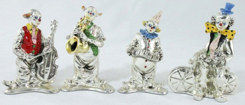 (4) Sterling Nuova Max Art Clown Figurines: Lot of (4) sterling silver laminated and handpainted Nuova Max Art Clowns. Clown on bike (measures 4" x 2.25" x 5"), Clown w/ cello (measures 3" x 1.5" x 4.25"), Clown playing sax (measures 3" x 2" x