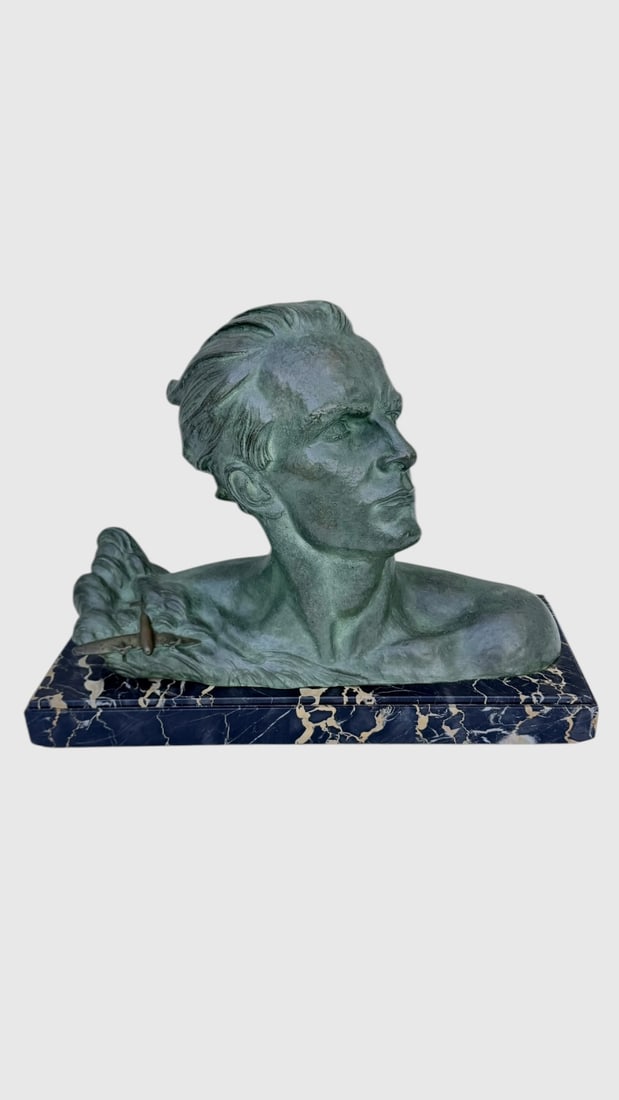 Alexandre Ouline Art Deco Bronze of Jean Mermoz: Alexandre Ouline (Belgian 1918-1940) art deco bronze bust of the French aviator Jean Mermoz. Sculpture has a green patina and is mounted on black marble base with gold veining. Jean Mermoz nicknamed t