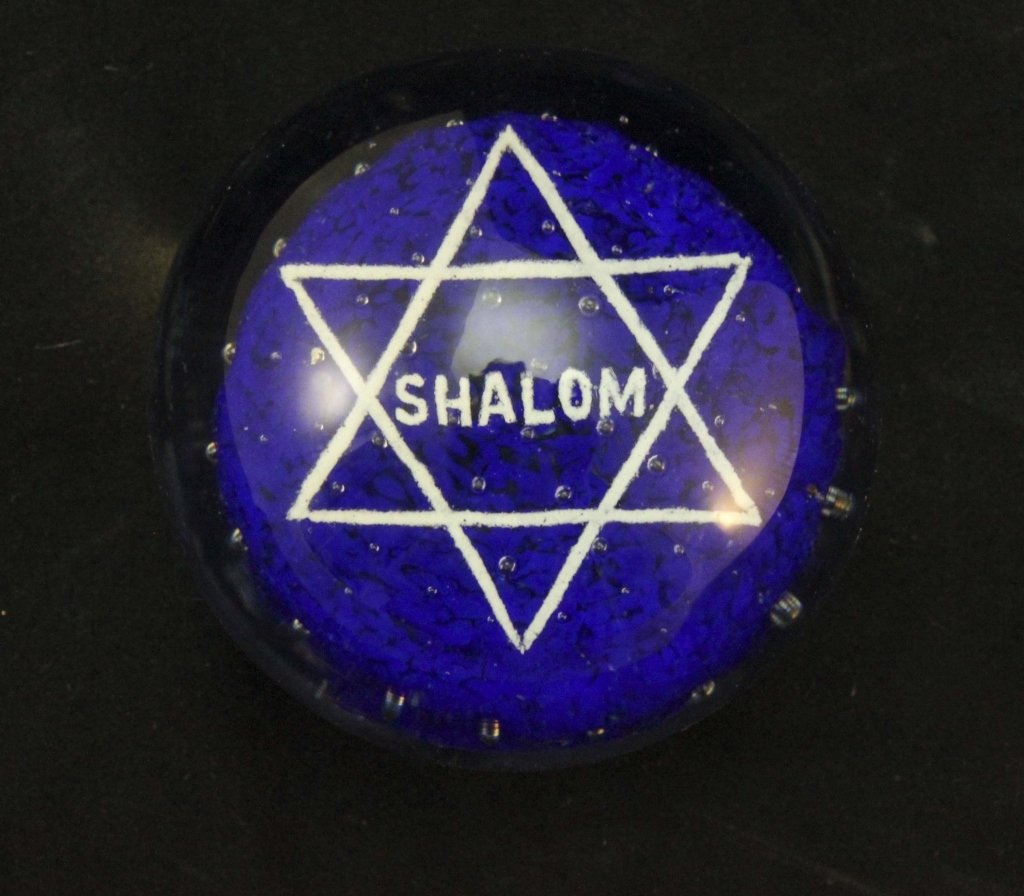 John Gentile "Shalom" Glass Paperweight: John Gentile (Italian-American 1924-2006), Gentile Glass, Morgantown, WV. Cobalt blue and white paperweight with a star of David and "Shalom" suspended above a cobalt blue bed with bubbles. Marked on
