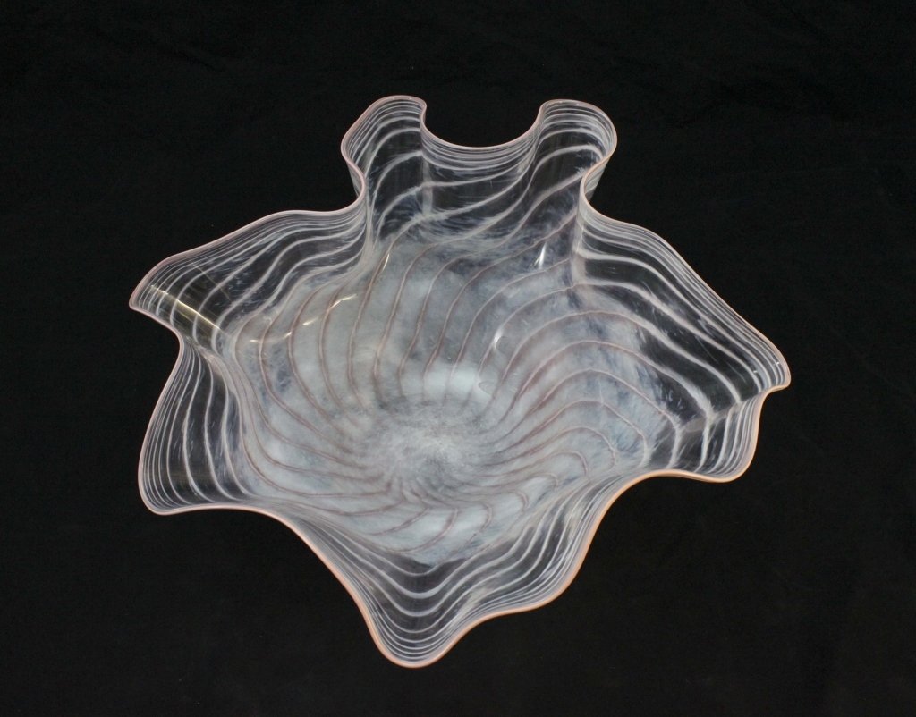 Phil O'Reilly Signed Art Glass Bowl: Phil O'Reilly (American), studied and works with Dale Chihuly, signed blown glass bowl in pink and orange swirls. Signed and dated "Phil O'Reilly 88" on bottom. Measurements: 21.25" 19.5" 10.5" Period