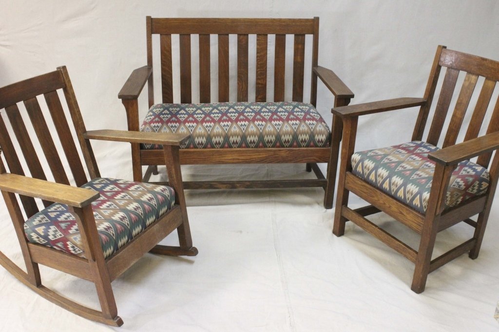 Arts & Crafts Three-Piece Parlor Set: Arts & Crafts three-piece parlor set including: settee measuring 44.5" x 22.5" x 36.5", chair measuring 26.5" x 23" x 36" and a rocker measuring 26.5" x 24" x 33.5". Measurements: See Description Peri