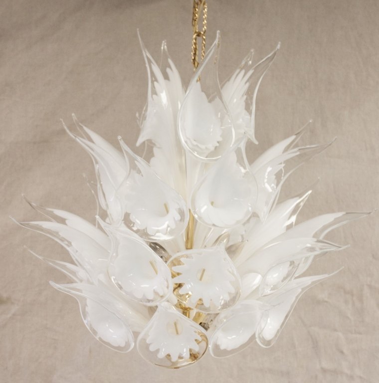 8 Light Murano Lily Form Chandelier: Murano Lily Form Chandelier on Polished Brass Frame Measures: 25.5 Diameter x 25.5" Tall From Tip of Glass to Base" Measurements: See Description Period: 1980's