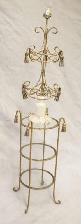 Hollywood Regency Gilt Iron Tassell Table & Lamp: Hollywood Regency Gilt Iron Tassell Table with Matching Lamp. Table is 3 tiered with glass 12 dia glass, overall height 31" . Lamp has alabaster base 12" dia x 30" to base of harp." Measurements: See