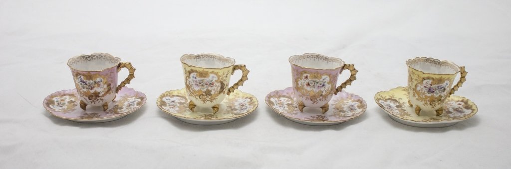 Set of 4 J.Pouyat Limoges Cups & Saucers: Set of 4 Hand Painted and finely Decorated Floral Rococo J. Pouyat Limoges Cups and Saucers. 2 Yellow Cups and Saucers and 2 Pink Cups and Saucers. Saucers Measure 5 x 4.5" x 1"" Cups Measure 3.5 x 2.