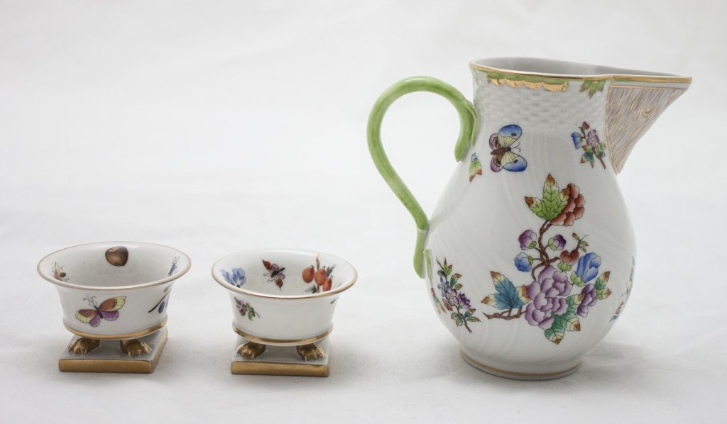 Herrend Queen Victoria Salts & Milk Pitcher: 2 Herrend Queen Victoria Salts and 1 Milk Pitcher. Salts Measure 2.75 dia x 1.75" Pitcher Measures 4" dia x 5.75" Minor damage to handle of pitcher." Measurements: See Description Period: Mid Century 