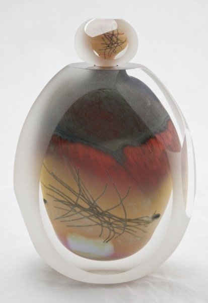 Steven E. Mann Desert Series Sculptural Bottle: Steven E. Mann art glass sculptural bottle. Desert series. Signed on bottom Steven Mann 1998. Measurements: 5" x 2.5" x 5.25" Period: 1990's Artist: Steven E. Mann