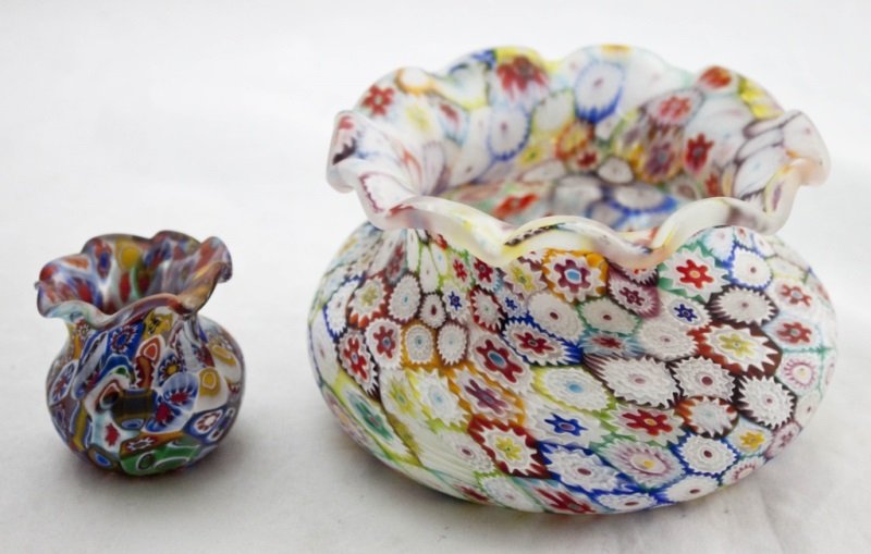 2 Murano Scalloped Edge Millefiori Cane Glass Bowl: Two Murano scalloped edge matte millifiori cane glass bowls. Both are matte inside and out with multi-colors. Large bowl measures 6" dia x 3.5" tall Small bowl measures 2" dia x 2" tall Measurements: