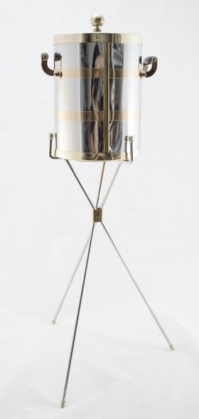 Polished Chrome and Brass Ice Bucket and Stand: Mid C Modern Polished Chrome and Brass Ice Bucket and Stand by Kraftware. Bucket: 9.5" wide x 12" Stand: 23.25" Measurements: See Description Period: Mid Century Modern Artist: Kraftware NYC