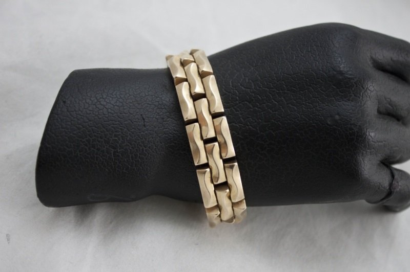 14k Gold Square Links Bracelet: 14k Gold square links bracelet with safety chain and watch band clasp. Marked 14k. Measurements: 7.5" x .52" Period: 18 dwt Artist: 14k