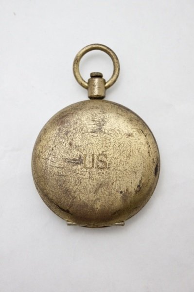 U.S. Military Compass Mfg. By Smith & Wesson N.Y.: U. S. Military Compass Mfg by Schwab & Wuischpard NY In a brass case Marked U.S. Minor oxidation to exterior of brass case. All parts are intact, needs calibrated. Dimensions: 1 3/4" dia x 1/2" Period